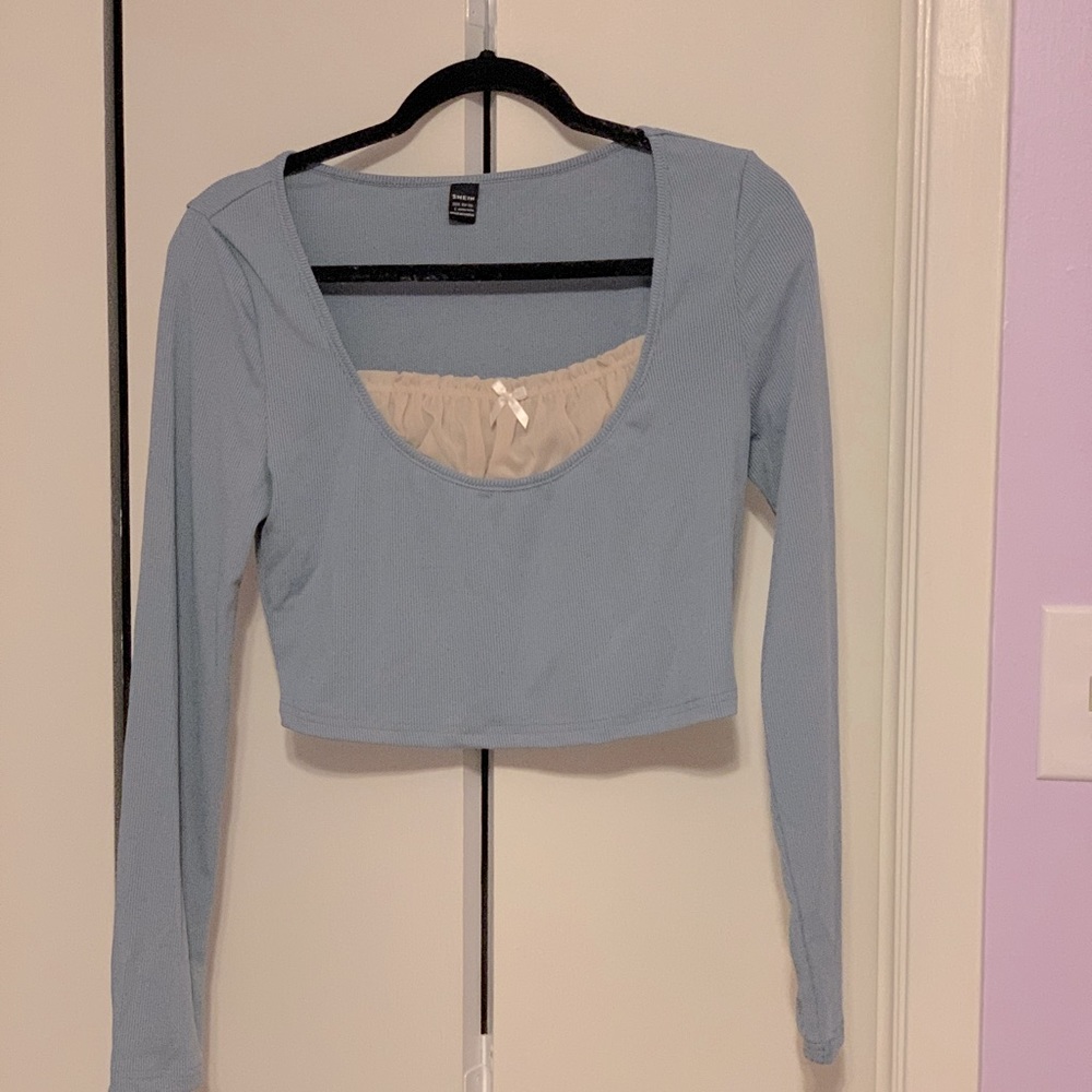 Blue/grey long sleeves with tan imitated camisole.